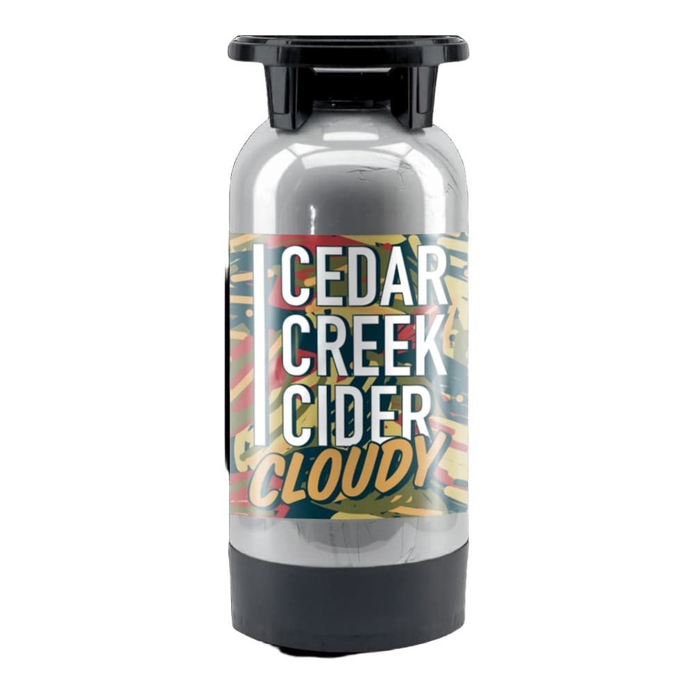 Clear glass bottle with black cap containing Cedar Creek Cider Cloudy drink, featuring a colourful label with red, yellow, and teal design elements on a white background.