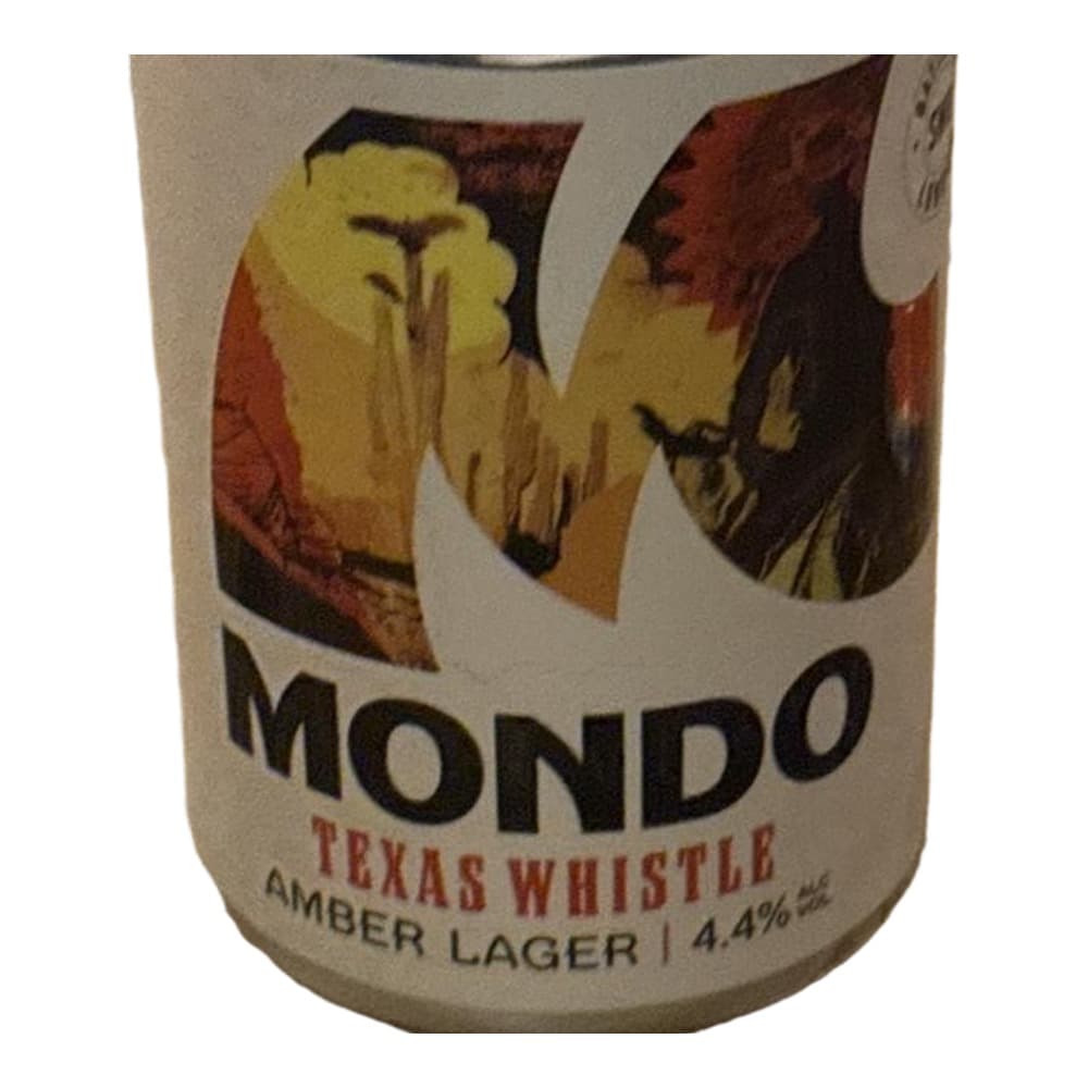 A Mondo Texas Whistle amber lager beer can with 4.4% ABV displayed against a wooden background, featuring artwork of a yellow bird on the label.