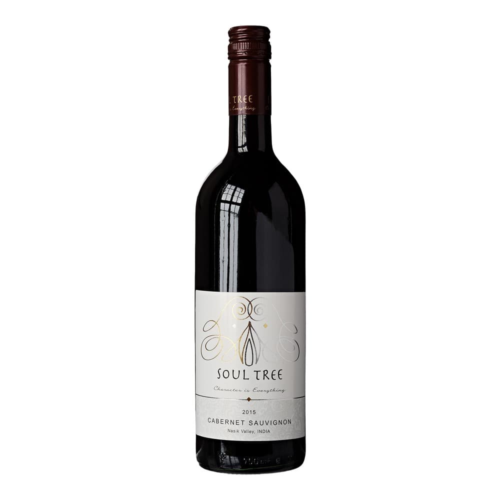 A bottle of Soul Tree Cabernet Sauvignon 2015 from Nasik Valley, India, displayed against a white background with a deep burgundy foil cap and decorative label featuring tree motifs.