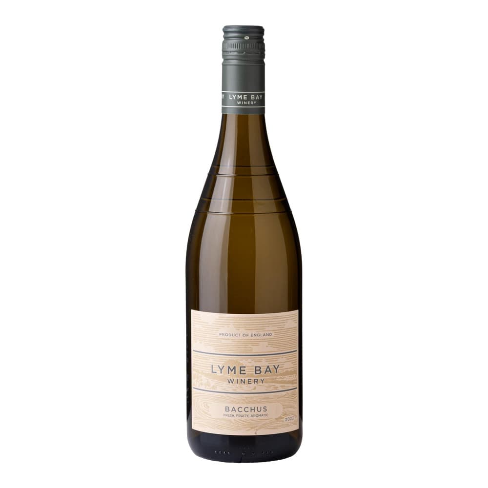 A bottle of Lyme Bay Winery Bacchus white wine from England, featuring a pale straw-coloured wine in a clear glass bottle with a cream and blue label against a plain white background.
