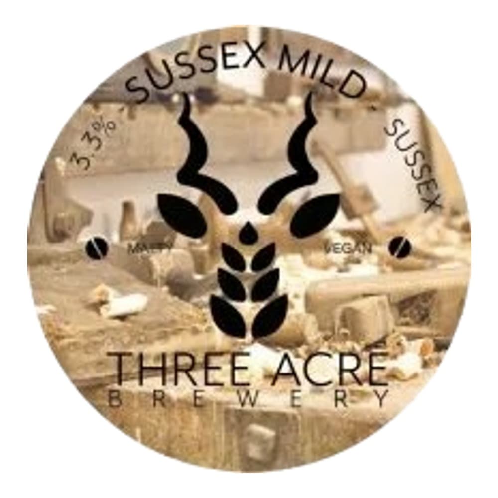 Circular brewery logo for Sussex Mild from Three Acre Brewery, featuring a stylised antelope head design with wheat or grain motifs on a beige background