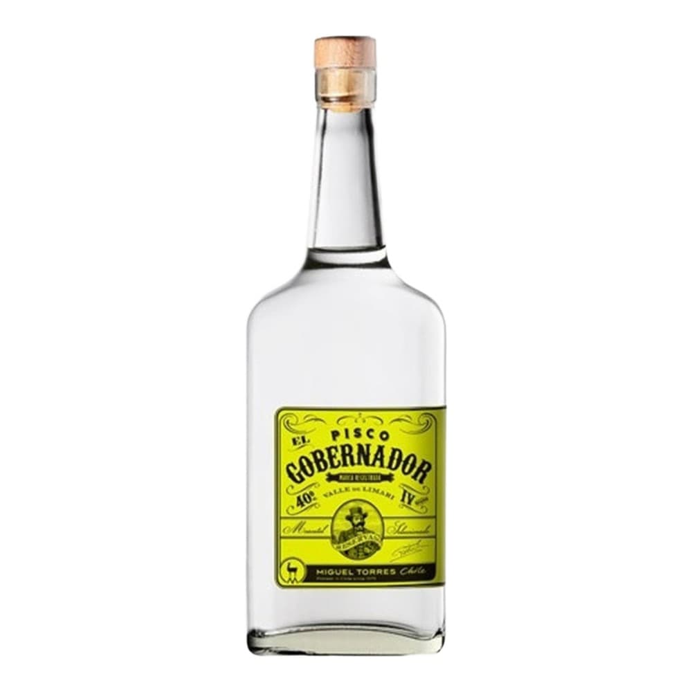 A clear glass bottle of El Pisco Gobernador with a bright yellow-green label, featuring decorative typography and a crest emblem, topped with a natural cork closure.