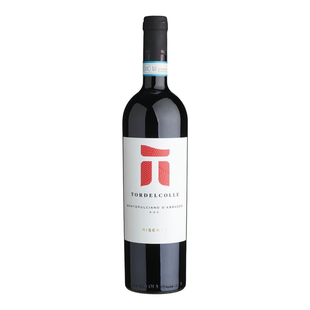 A bottle of Tordelcolle Montepulciano d'Abruzzo Riserva red wine with a white label featuring a red geometric logo, isolated on a white background.