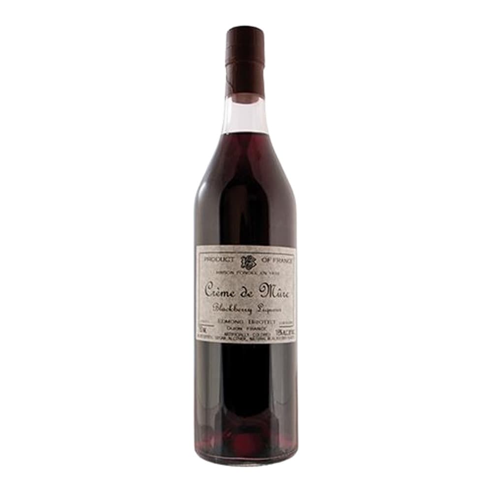 A bottle of Crème de Mûre blackberry liqueur with cream label against a plain white background