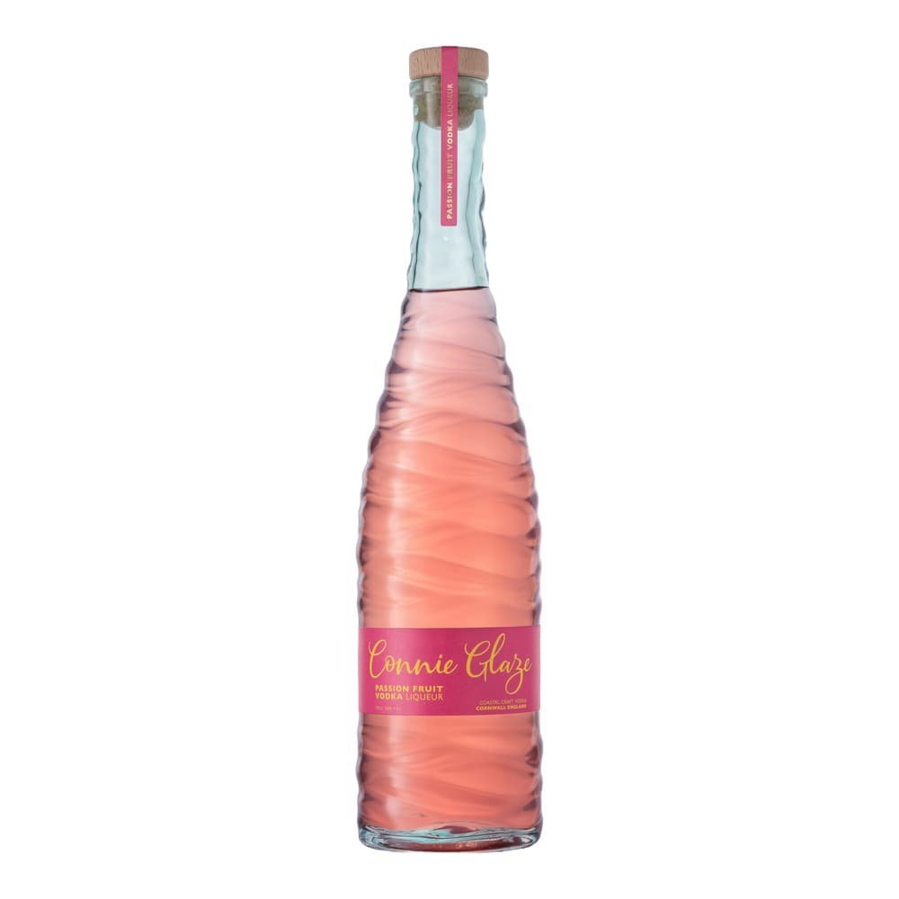 A bottle of Connie Glaze passion fruit vodka liqueur with pink liquid, wooden cork stopper, and magenta label, photographed against a white background.