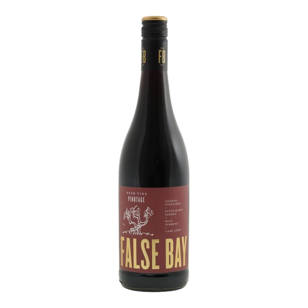 A bottle of False Bay Bush Vine Pinotage red wine with a dark glass bottle, burgundy and gold label, and gold foil cap on a white background.