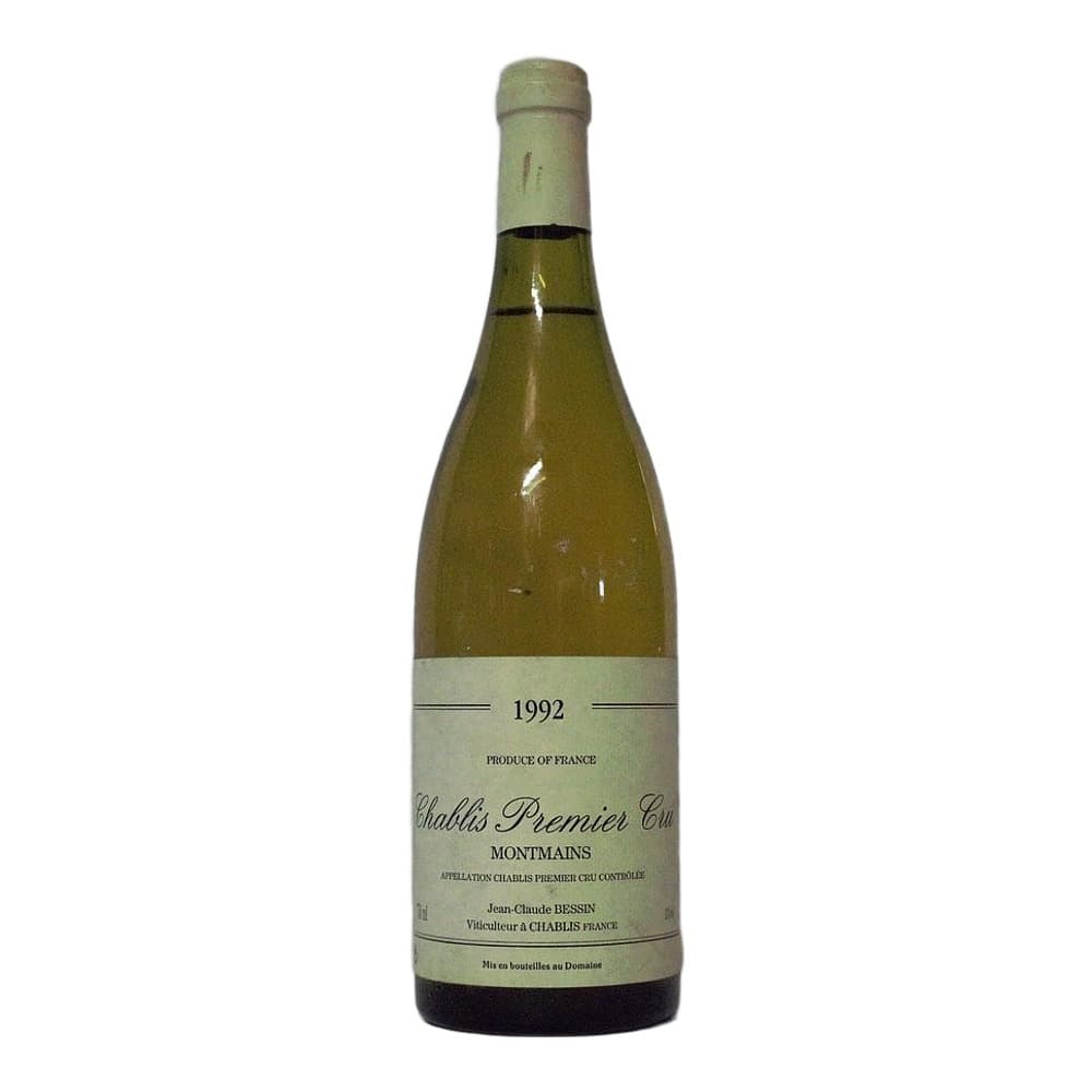 A bottle of 1992 Chablis Premier Cru Montmains white wine by Jean-Claude Bessin against a plain grey background.