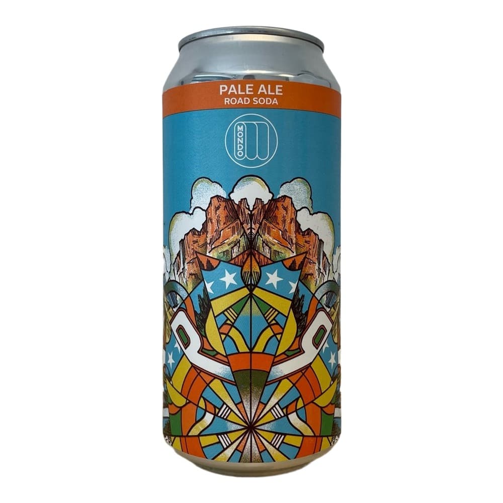 A metallic can of Pale Ale Road Soda featuring an orange header label and a colourful mandala-inspired illustration with mountain imagery and decorative geometric patterns on a wooden surface.