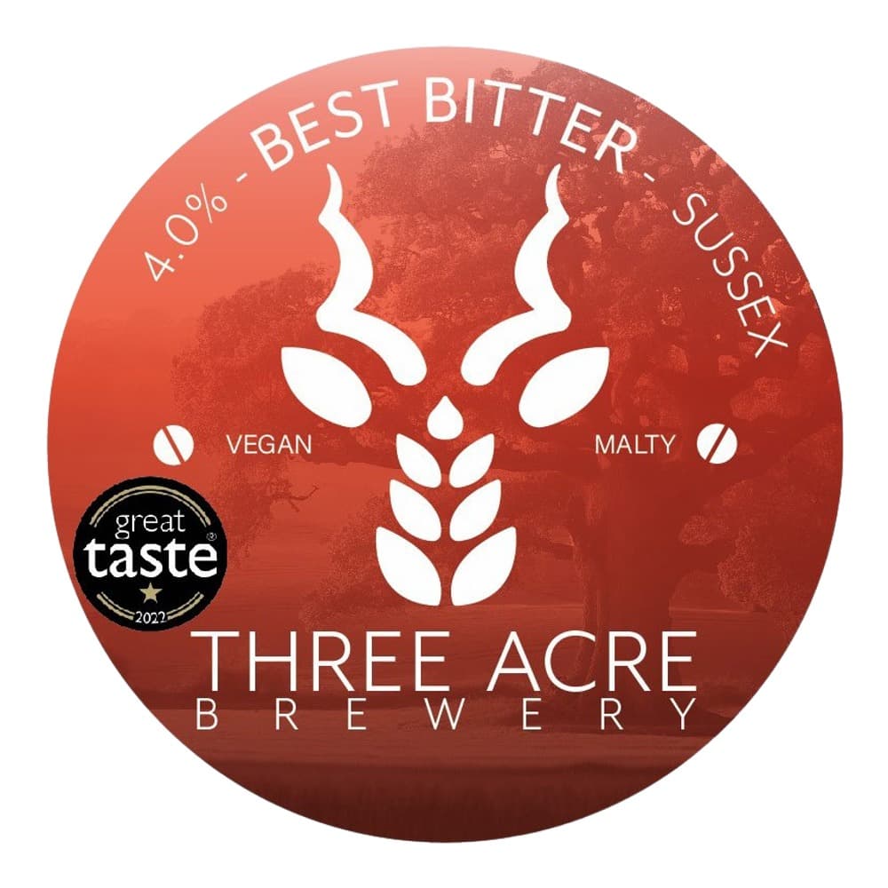 Circular red beer label for Three Acre Brewery featuring a white horned beast logo, indicating a 4.0% ABV best bitter ale with vegan and malty characteristics, with a Great Taste 2022 award badge.