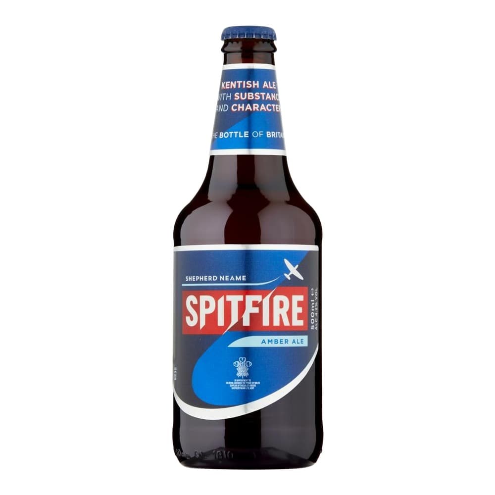 A Spitfire Amber Ale beer bottle with a blue and red label featuring a Shepherd Neame branding and aeroplane logo, photographed against a white background.