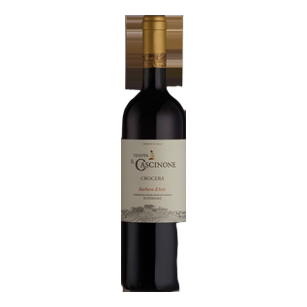 A bottle of Cocinero red wine against a plain beige background