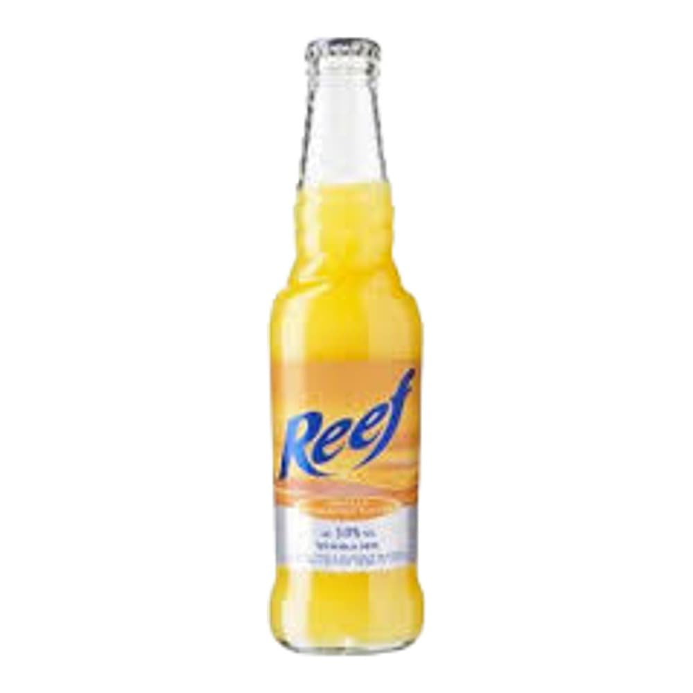 A clear glass bottle of Reeq lemon flavour beer with yellow liquid and a blue label, isolated on a white background.