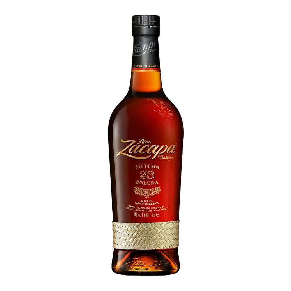 A bottle of Ron Zacapa Centenario Sistema 23 Solera Gran Reserva rum against a white background, featuring a dark glass bottle with a red label and natural fibre wrap around the neck.