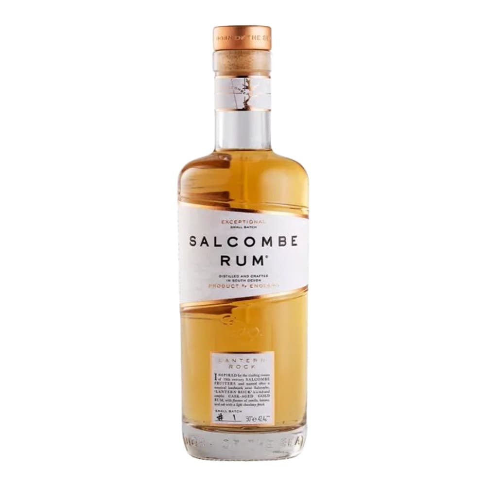 A bottle of Salcombe Rum with a wooden cork top and golden-coloured liquid, photographed against a plain white background with subtle shadow.