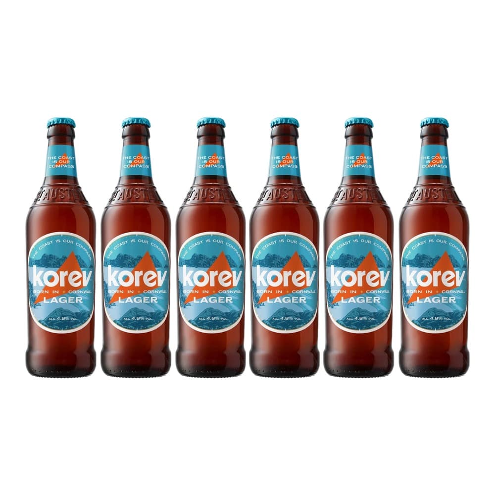 Six bottles of Korev Lager beer with turquoise caps and blue labels on white background