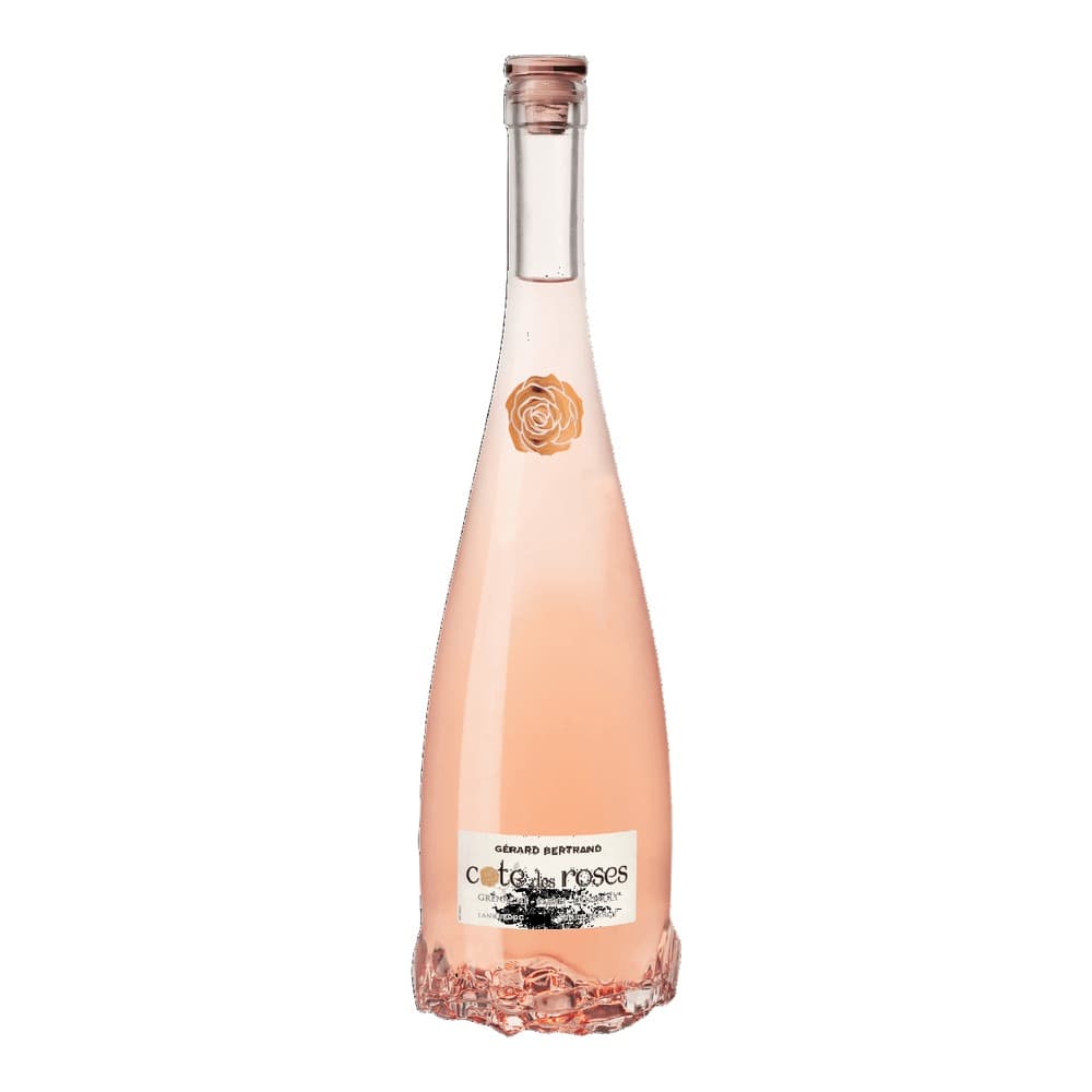 A bottle of Côte des Roses rosé wine with a pale pink label and gold rose emblem, featuring a copper-coloured cap, isolated on a white background.