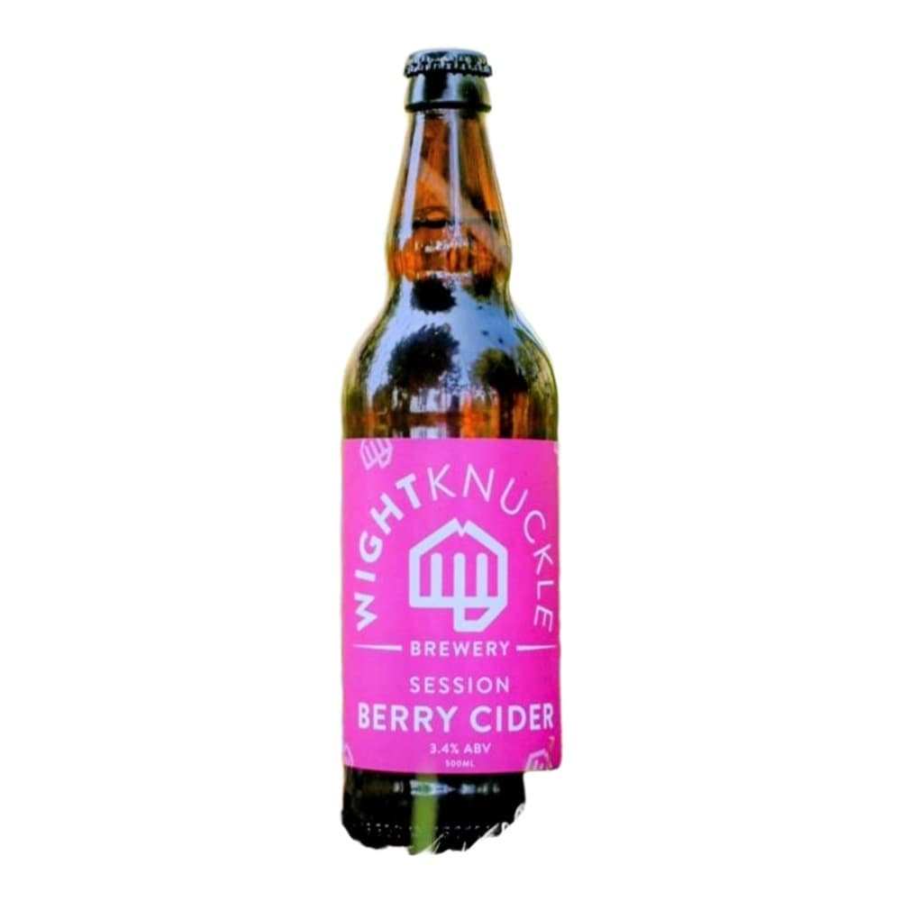 A bottle of Wightknuckle Brewery Session Berry Cider positioned amongst wild grasses and small white flowers in an outdoor natural environment.