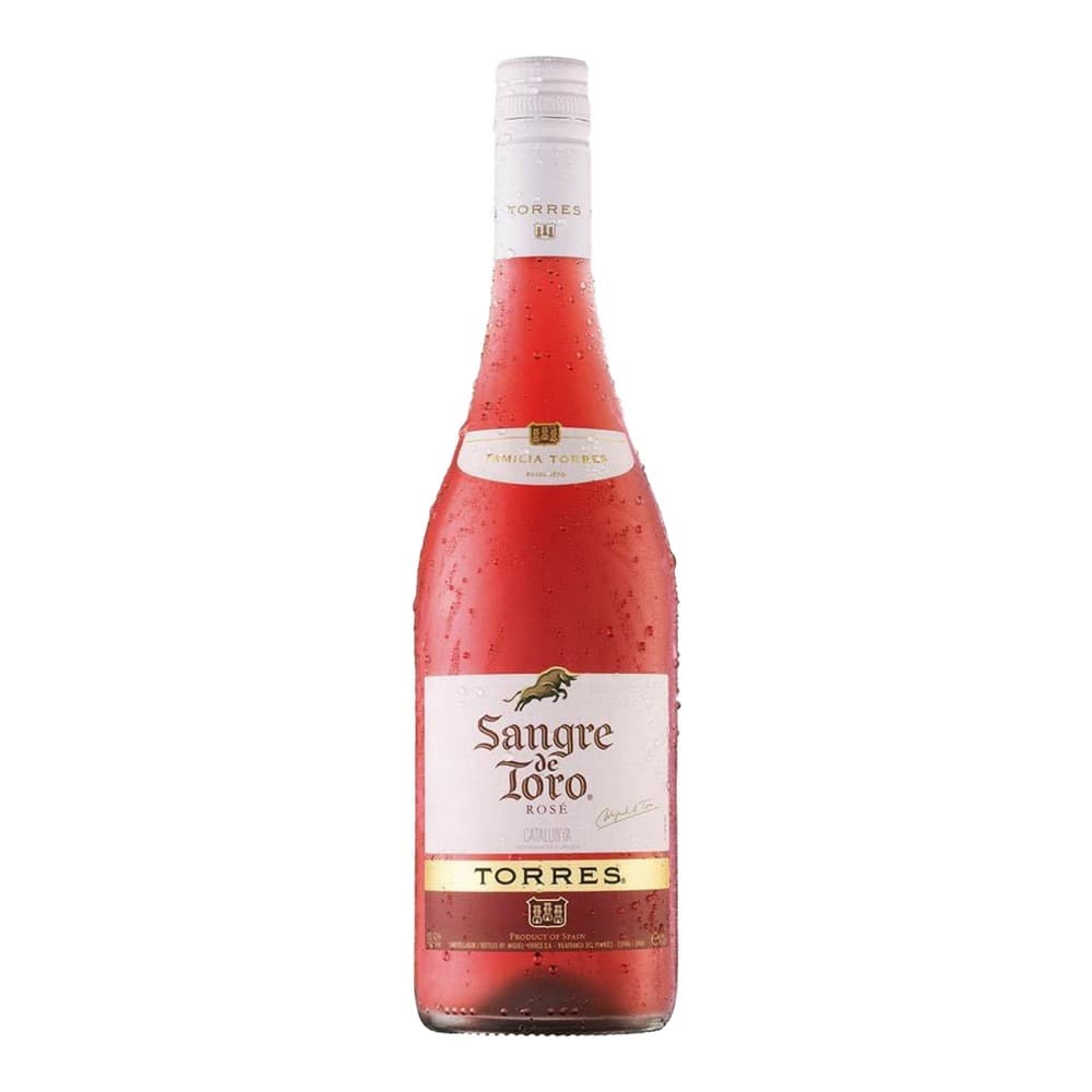A bottle of Sangre de Toro rosé wine from Torres, featuring a white and gold label on a red liquid, photographed against a white background with condensation on the bottle.