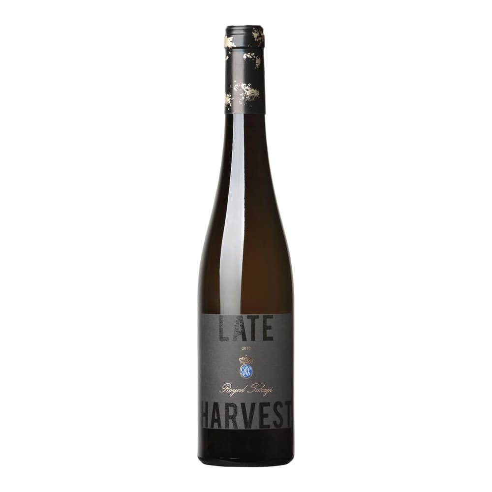 A bottle of Royal Tokaji Late Harvest wine from 2015, featuring a dark label with gold foil accents on the capsule, isolated against a white background.