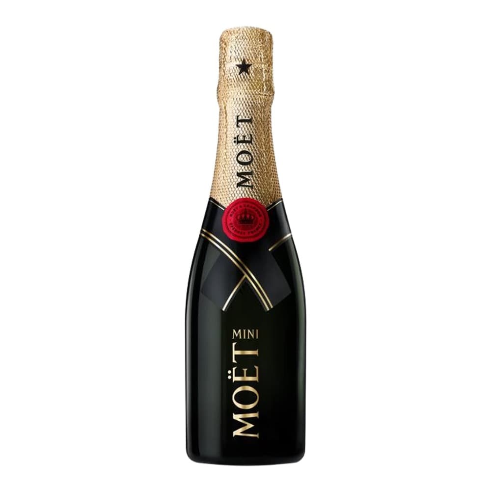 A bottle of Moët & Chandon Mini champagne with a gold foil-wrapped cork and foil, black label with gold text, and red wax seal, photographed against a white background.