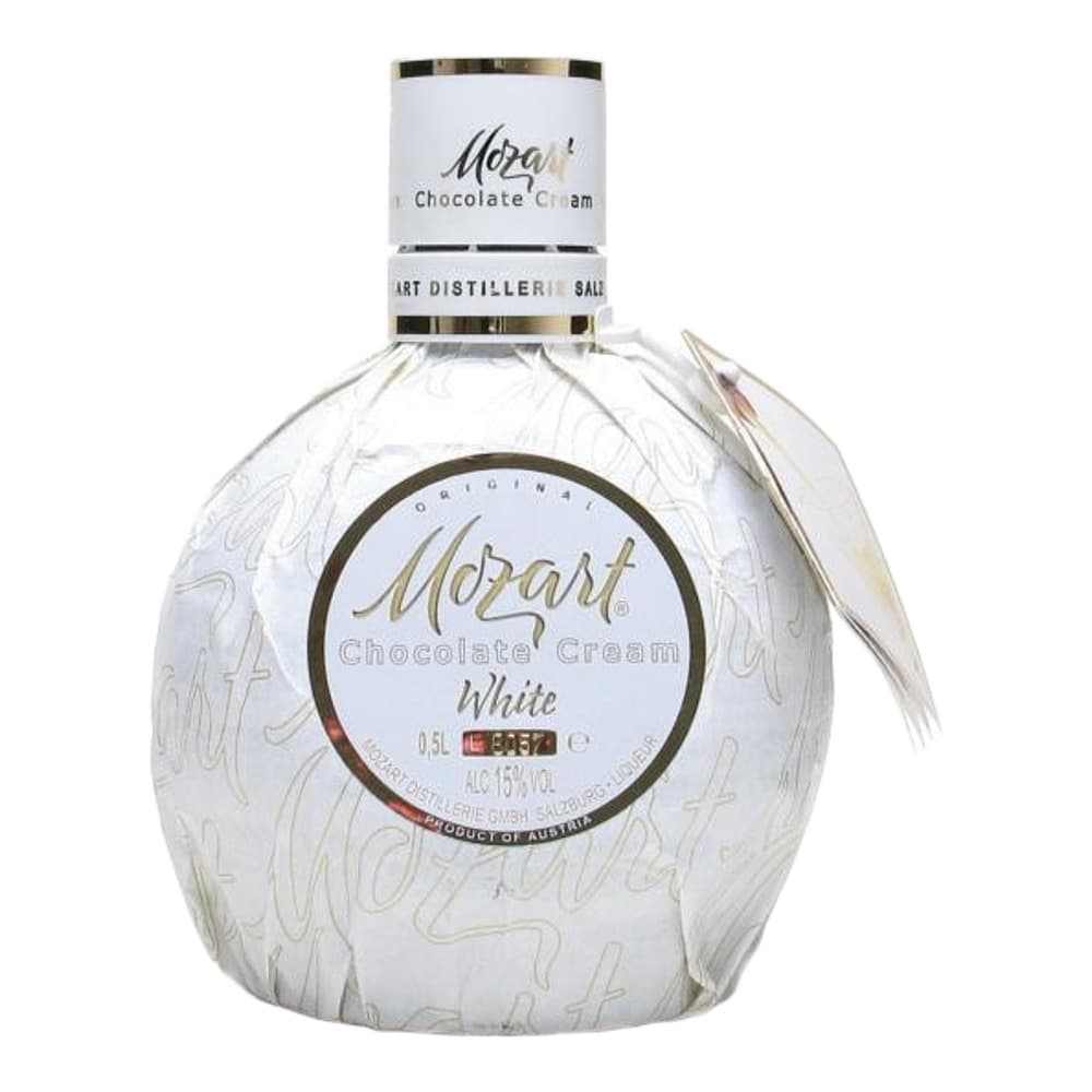 Clear glass bottle of Mozart White Chocolate Cream liqueur with white label and gold foil cap, photographed against a white background.