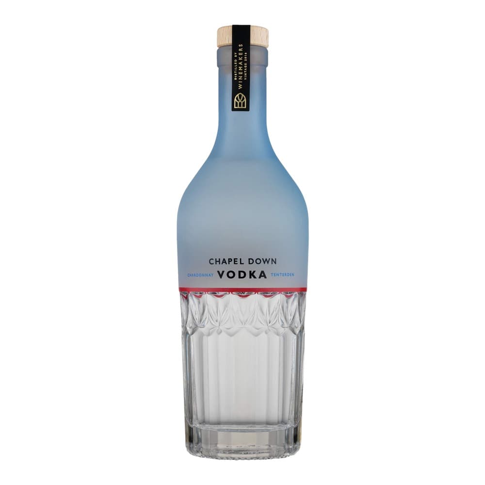 A bottle of Chapel Down Chardonnay Vodka Tenterden against a white background, featuring a blue frosted glass bottle with a natural wood and black cork top.