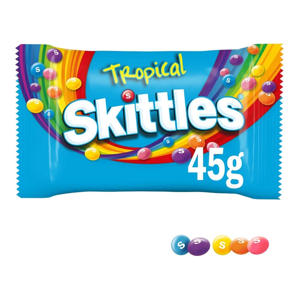 A pack of Tropical Skittles sweets in a blue wrapper showing colorful candies and rainbow design, 45g size