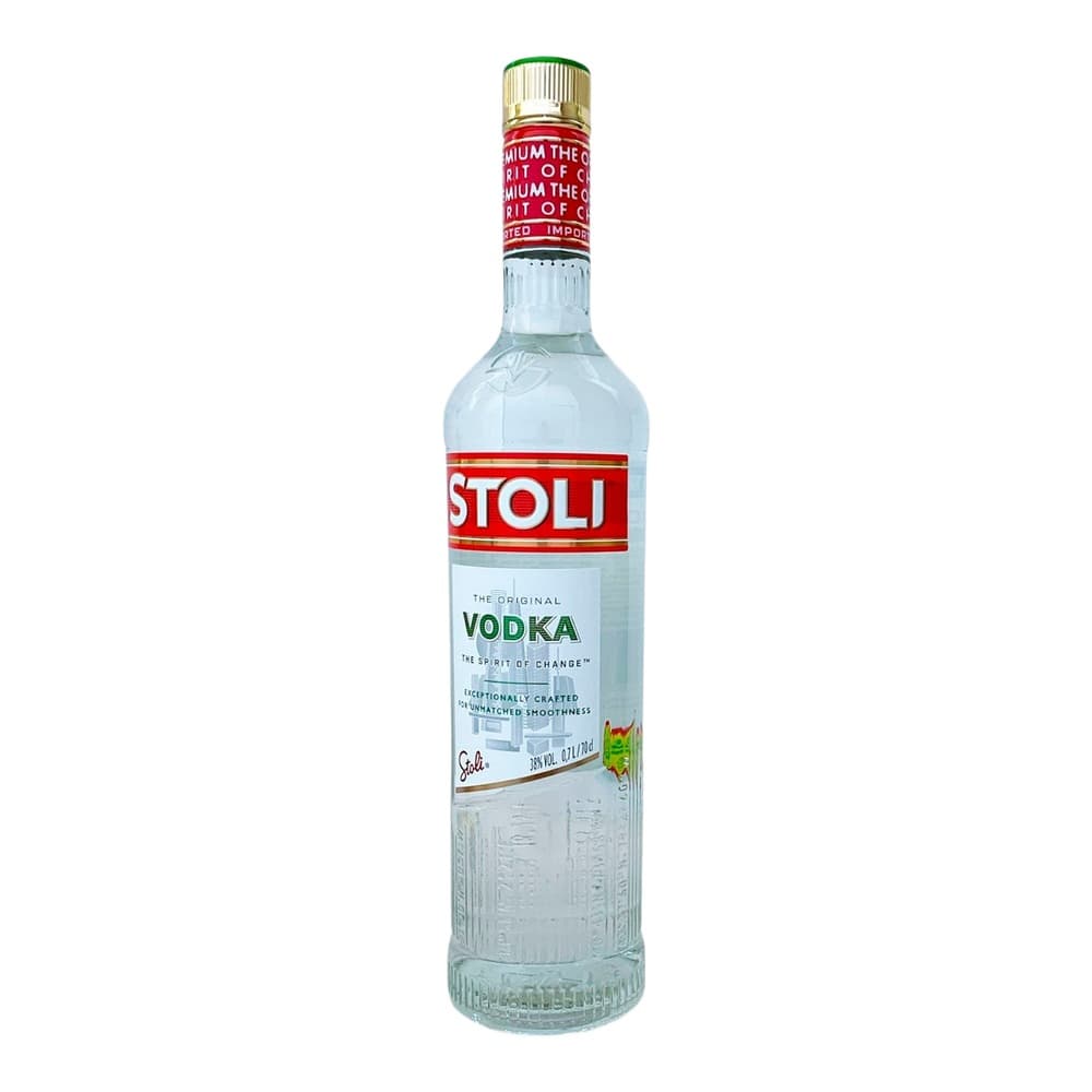 A clear glass bottle of Stoli Original Vodka with red and gold label and green cap, photographed against a white background.