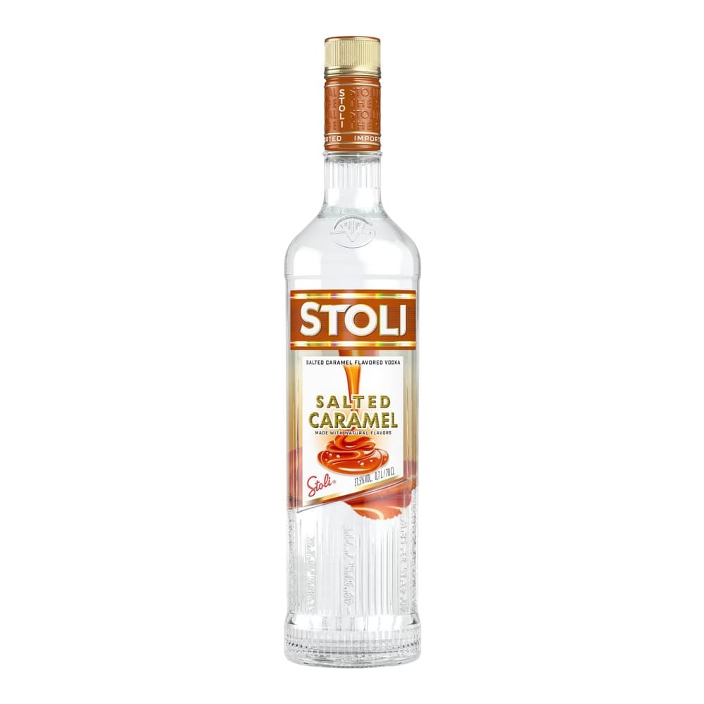 A bottle of Stoli Salted Caramel Flavoured Vodka with a gold and orange label, displayed against a white background.