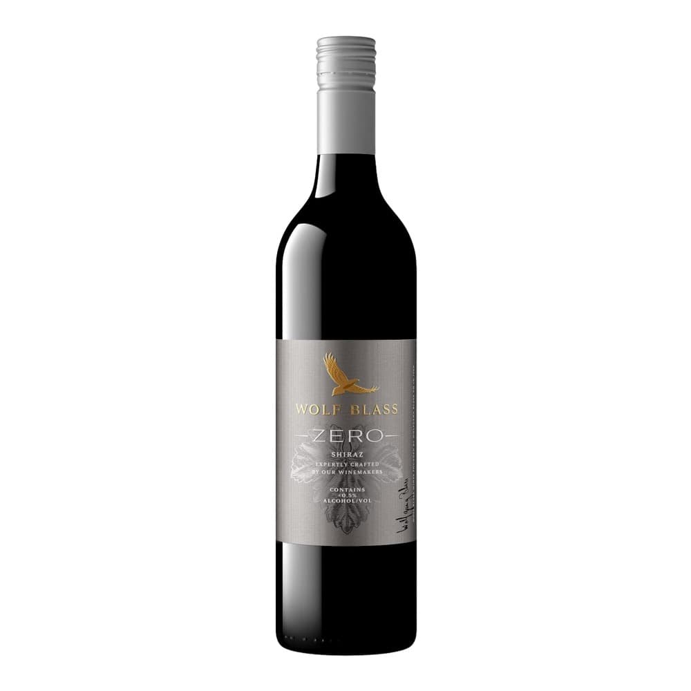 A bottle of Wolf Blass Zero Shiraz non-alcoholic wine with a silver label featuring a golden eagle logo, displayed against a white background.