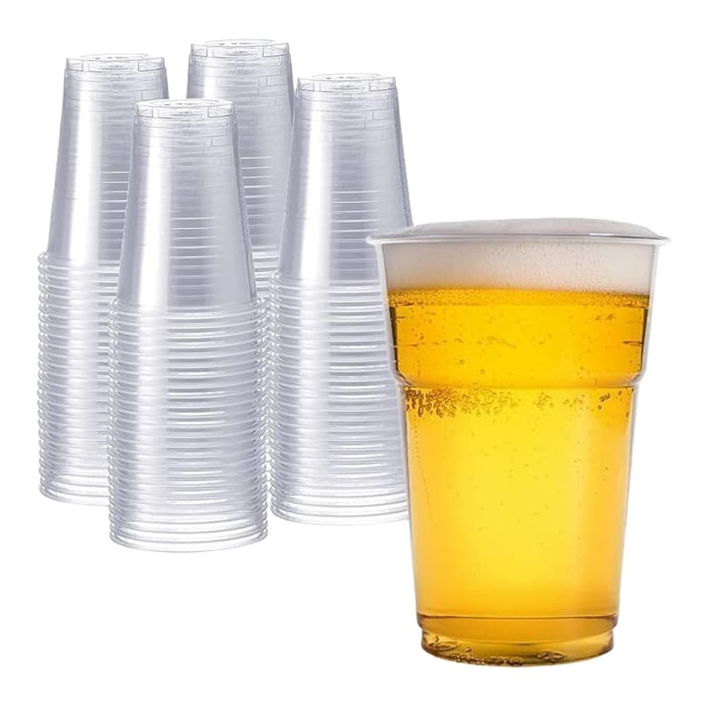 Stack of transparent disposable plastic cups with one filled with yellow beer, displayed on white background