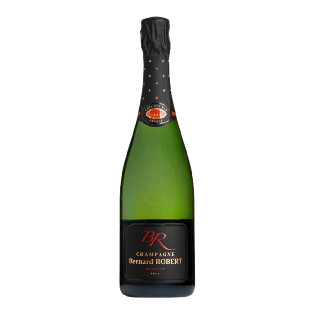 A bottle of Bernard Robert Champagne Brut Reserve with green glass and black foil-wrapped top, displayed against a white background.