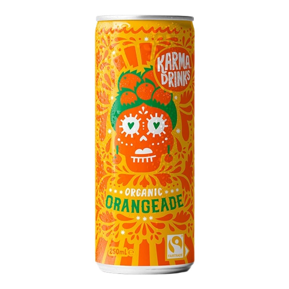 Orange aluminium can of Karma Drinks organic orangeade with decorative skull design and green leaf details on yellow and orange background