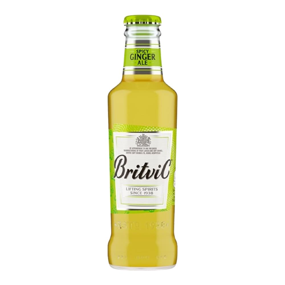 A glass bottle of Britvic Spicy Ginger Ale with a bright green label and yellow liquid, isolated on a white background.