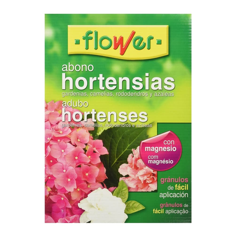A product package for Flower brand hortensia fertiliser featuring pink and white hydrangea flowers on a green background, with bilingual Spanish-Portuguese labelling and a magnesium indicator badge.