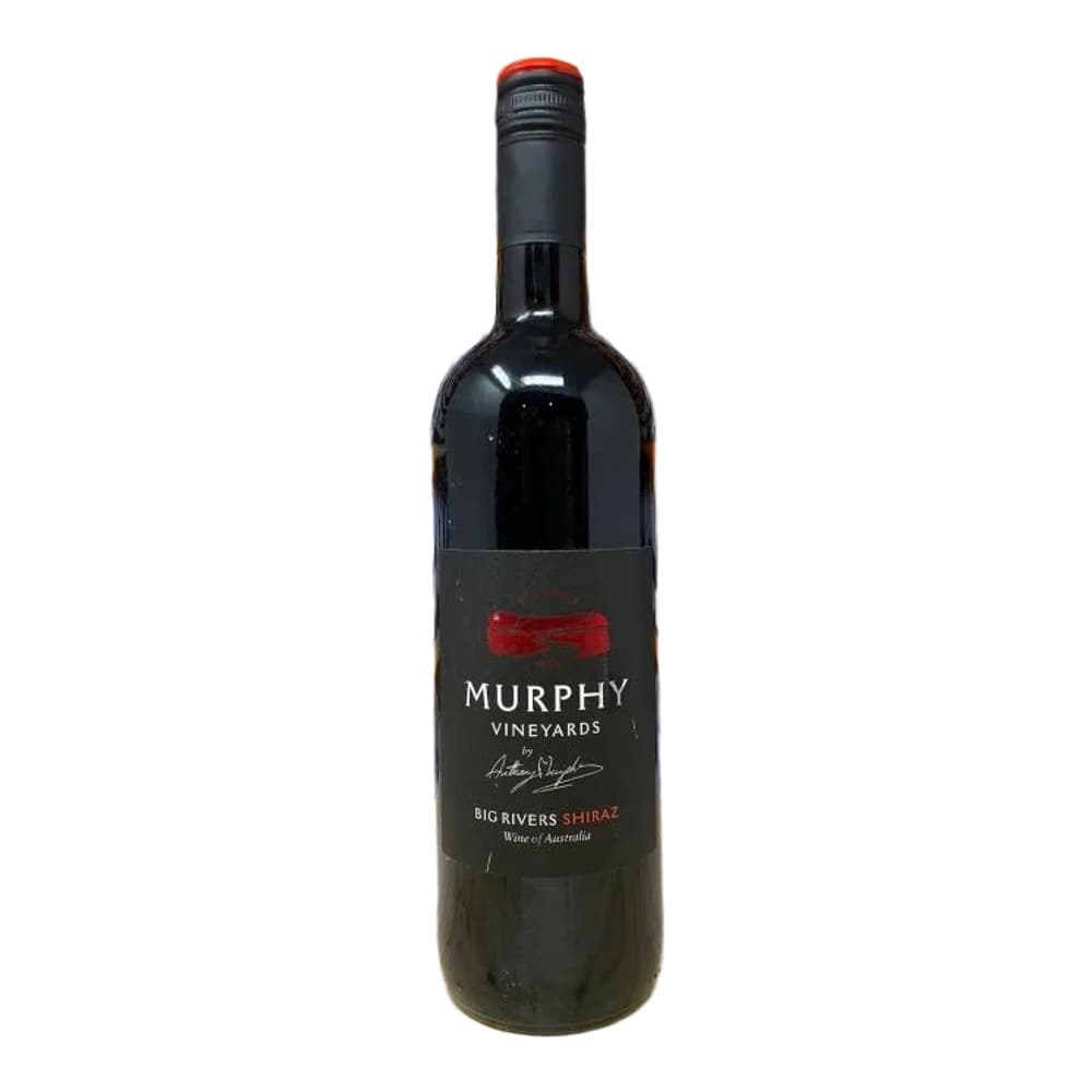 A bottle of Murphy Vineyards Big Rivers Shiraz wine positioned on a wooden counter in front of a well-stocked wine shop display wall.