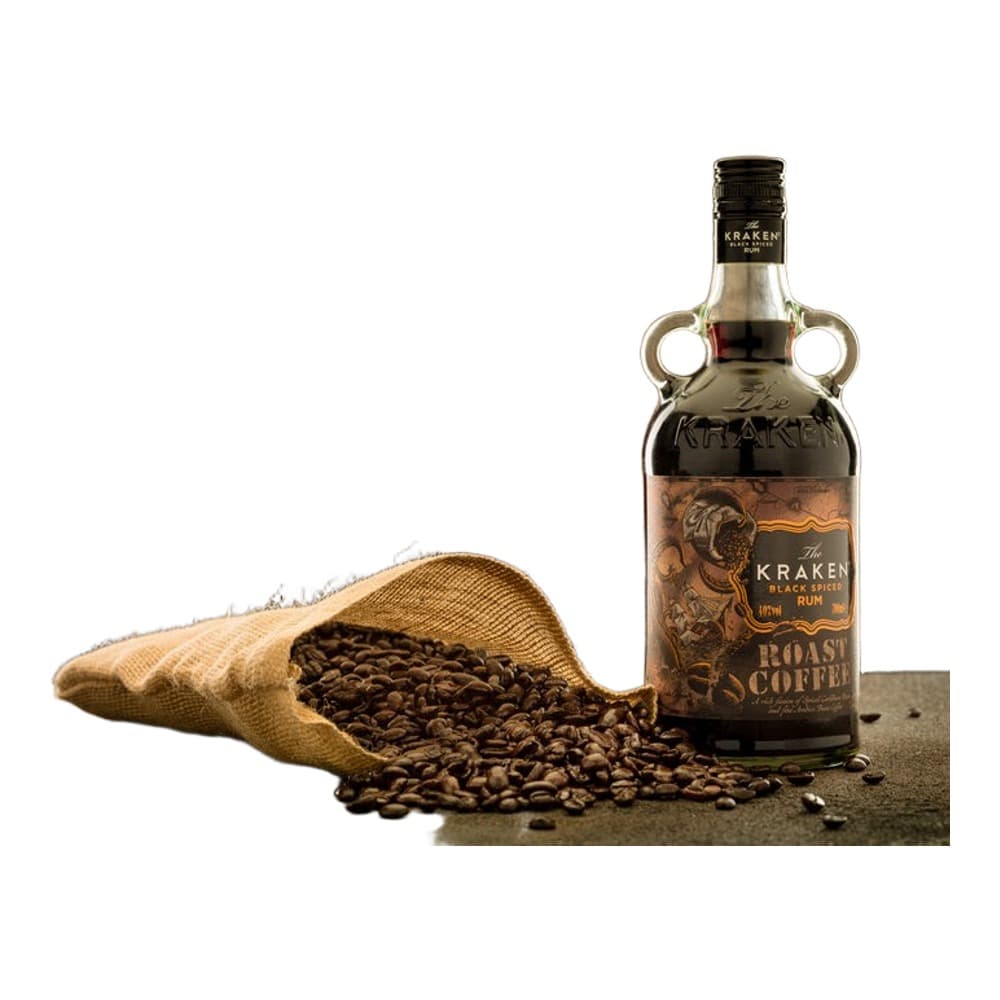 A bottle of Kraken Black Spiced Rum displayed alongside roasted coffee beans spilling from a burlap sack against a textured brown background.
