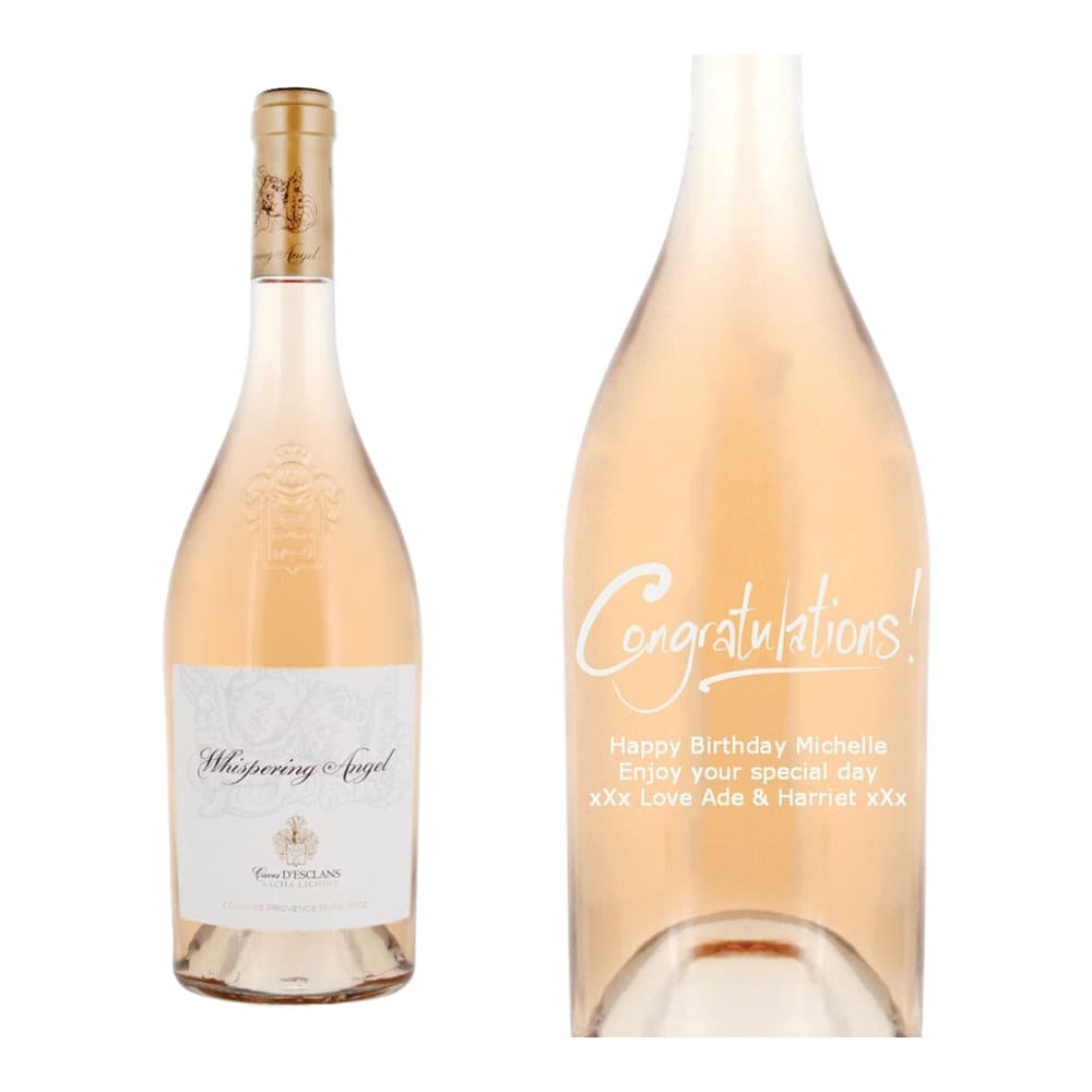 Two views of a Whispering Angel rosé wine bottle on a white background, with personalised congratulations and birthday message engraved on the right bottle.