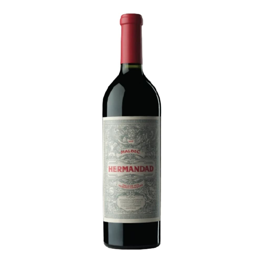A bottle of Hermandad Malbec red wine with a red foil cap and ornate grey label on a white background