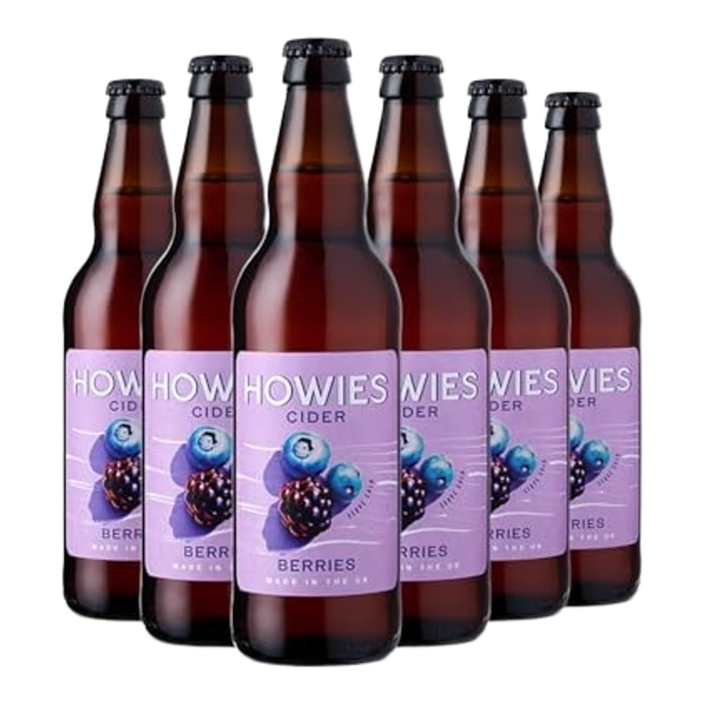 Six brown glass bottles of Howies Berry Cider arranged in a line against a white background, each with purple labels featuring berry imagery.
