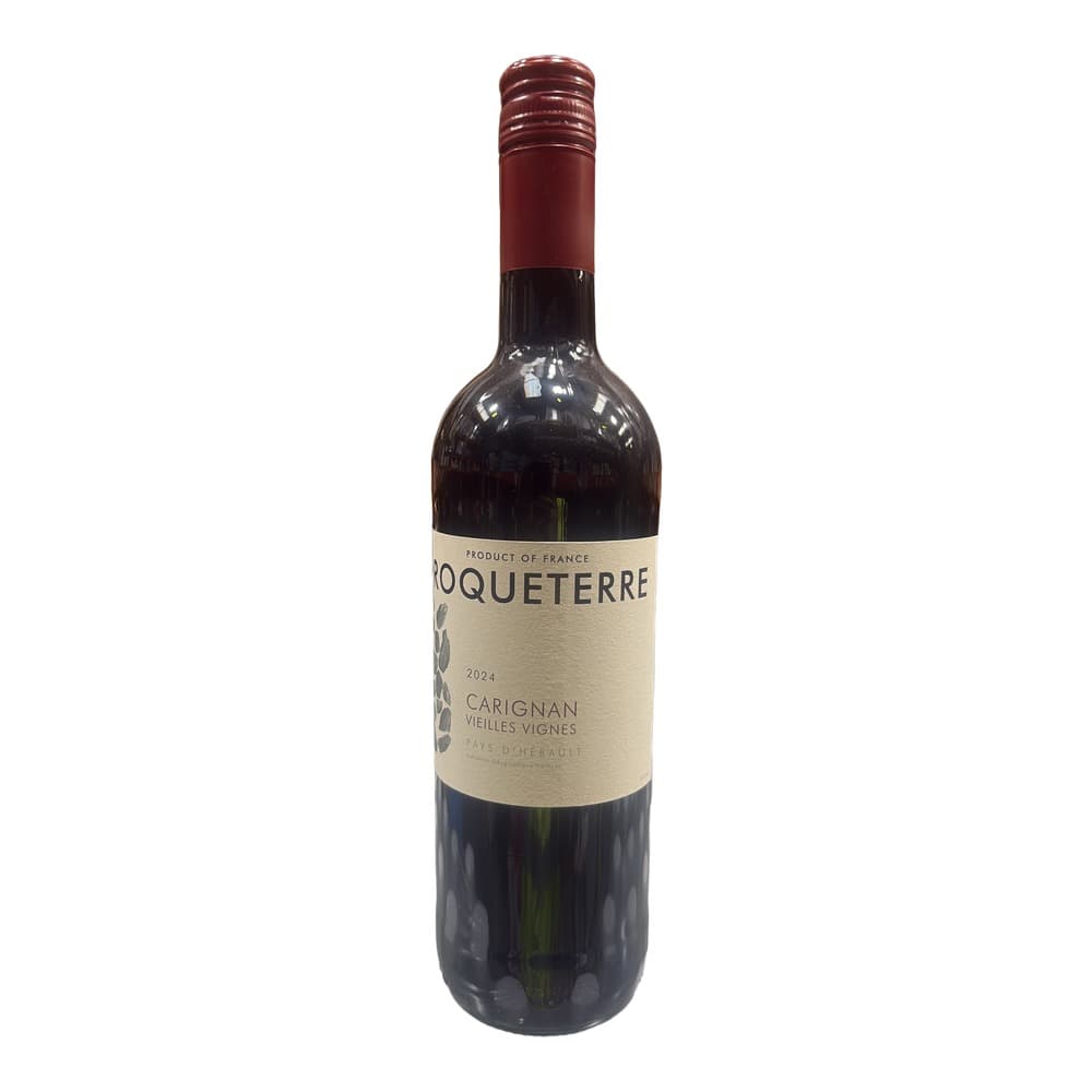 A bottle of Roqueterre Carignan Vieilles Vignes 2024 red wine from France, displayed on a white surface with a burgundy foil capsule and cream-coloured label.
