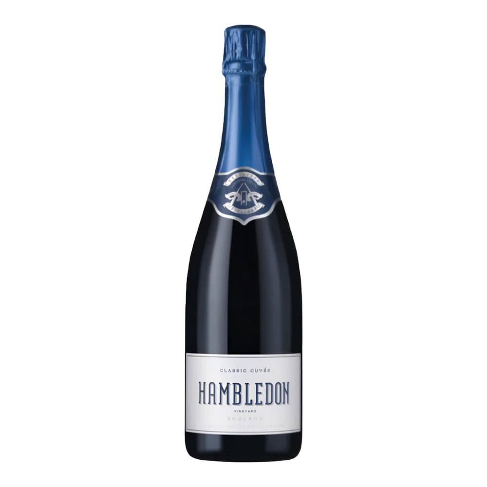 A bottle of Hambledon Classic Cuvée sparkling wine with a blue foil cap and white label on a plain white background.