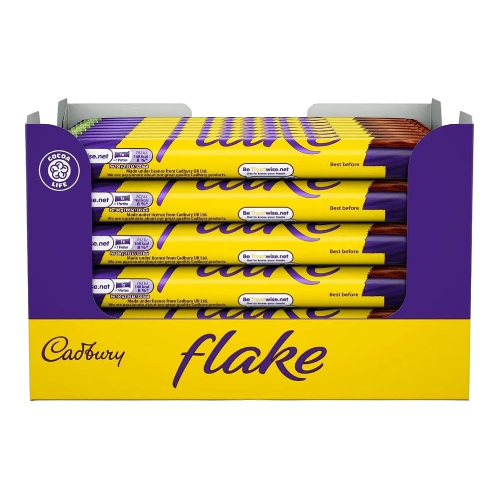 A display box of Cadbury Flake chocolate bars arranged in rows, showing the distinctive yellow wrapper with purple branding and Cadbury logo.