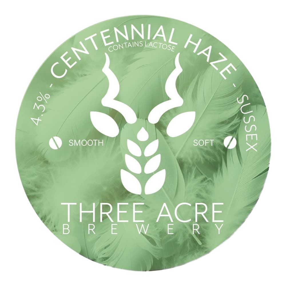 Circular beer label for Centennial Haze by Three Acre Brewery, featuring a white deer head logo and green leafy background, with 4.3% ABV and smooth, soft descriptors.