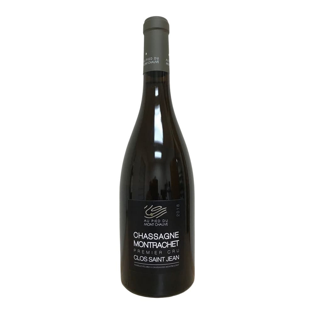 A bottle of Chassagne Montrachet Premier Cru Clos Saint Jean 2018 red wine with black label on white background