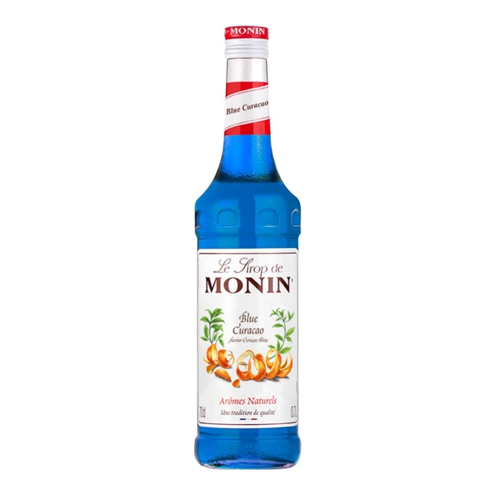 A bottle of Monin Blue Curaçao flavoured syrup with a red and white label, displayed against a white background.