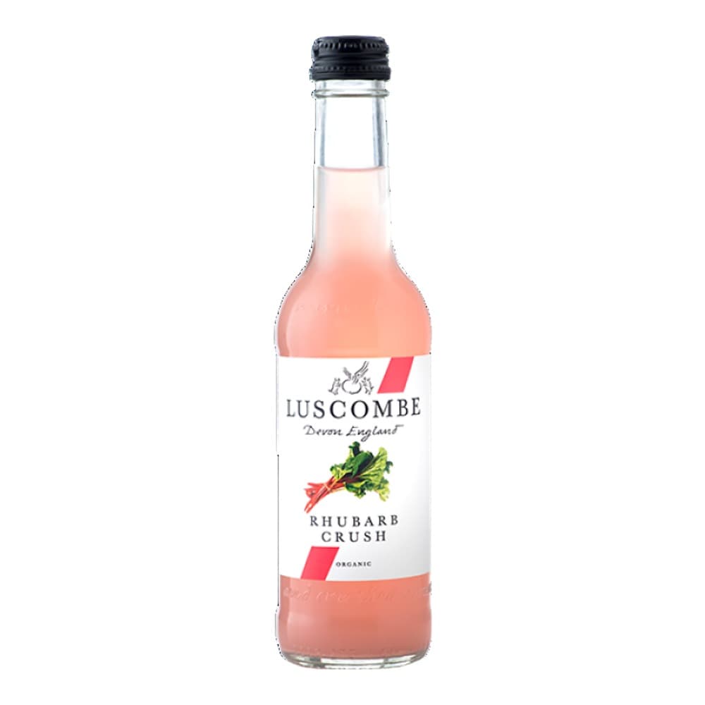 A clear glass bottle of Luscombe Rhubarb Crush organic beverage with a black cap, filled with pink liquid, displayed against a white background.