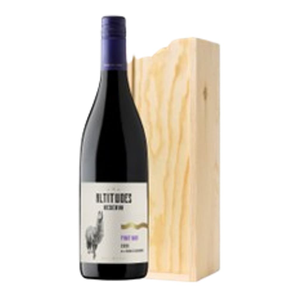A bottle of red wine displayed next to a natural wood gift box with rope handles.