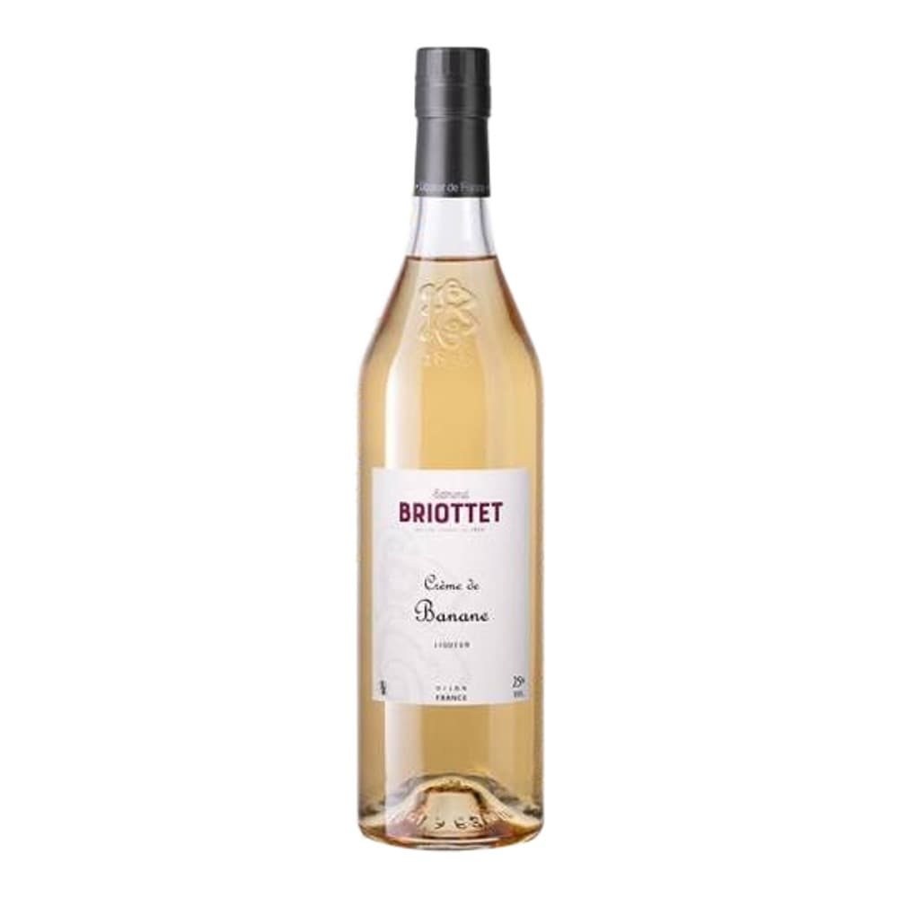 A bottle of Briottet Crème de Banane liqueur on a white background with decorative banana leaf illustrations.
