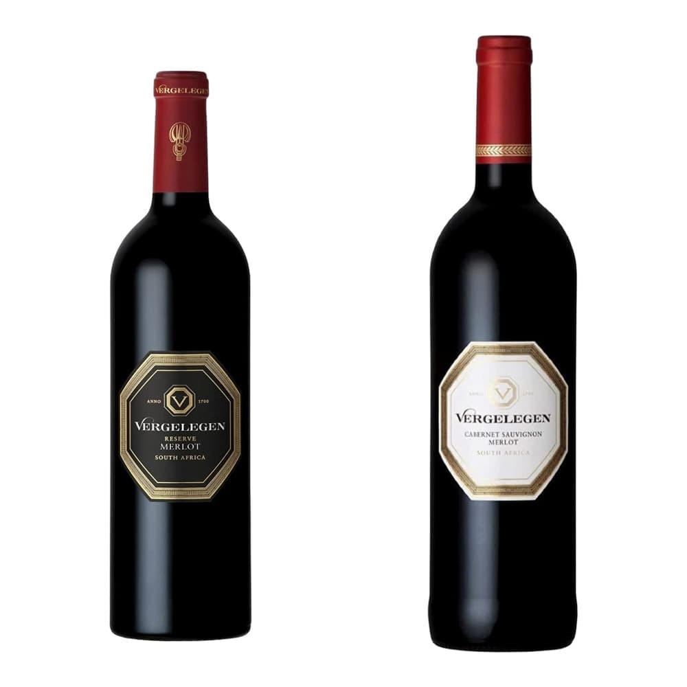 Two bottles of Vergelegen Merlot wine from South Africa displayed against a white background, showing Reserve and Cabernet Sauvignon varieties with gold-trimmed hexagonal labels and red foil capsules.